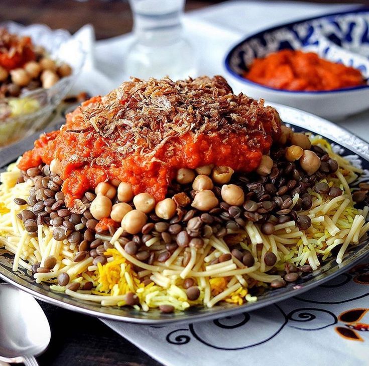 Egyptian Koshari bowl topped with crispy onions